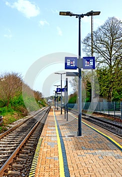 train platform with modern lanterns