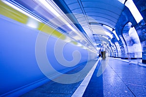 Train on platform in subway