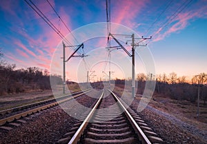 Train platform at sunset. Railroad. Railway station