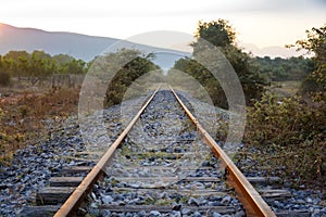 Train rails at the abandoned railroad network in Greece