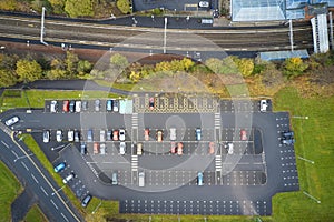 Train railway station and car park aerial view from above UK