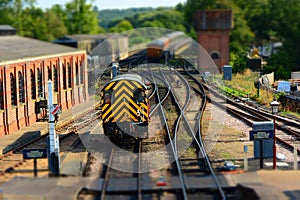 Train on railway track. Tilt shift