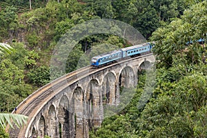 Train on Nine Arches bridge in hill country of Sri Lanka