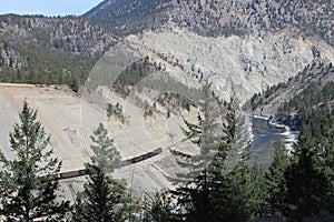 Train running along the river