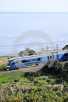 Train running by seaside of Izu, Shizuoka, Japan