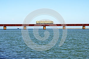 Train running on Yura Bridge over Yura River