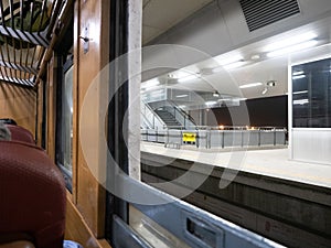 Train seat near window and looking out at view in local train, Travel transportation concept, Thailand