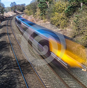 Train speeding through English countryside