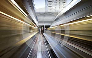 Train speeding past bridge - motion blur