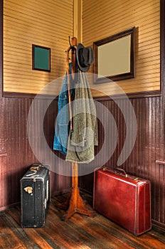 Train Station Coat Rack & Luggage in Corner