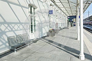 Train station platform wainting area photo