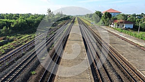 Train station see railway track line , platform, bird eye view