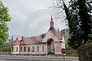 Train stop on mountains way near road