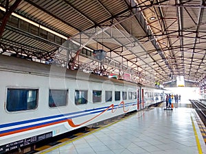 The train stop at the station on central Java