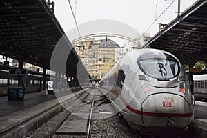 Train stop waiting in terminal for send and receive passenger at platform of Gare de Paris-Est or Paris Gare de l`est