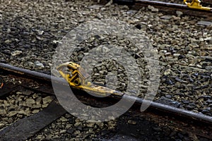 Train stopper or Train bumper installed on track for break. Train stopper for stop train running while parking at railway station photo