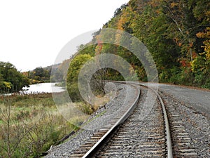 Train track runs alongside western Tioughnioga River in Cortland County NYS photo