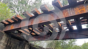 Train Track and Bridge Crossing a Small Creek