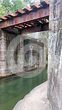 Train Track and Bridge Crossing a Small Creek