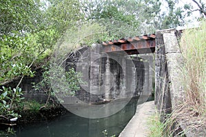 Train Track and Bridge Crossing a Small Creek