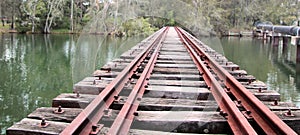 Train Track and Bridge Crossing a Small Creek