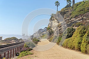 Train track and dirt road at the beach of San Clemente, California