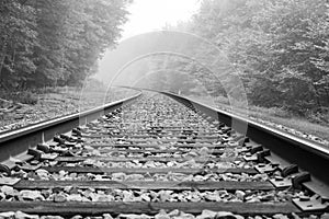 Train track into the fog