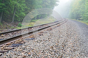 Train track into the fog