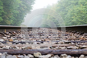 Train track into the fog