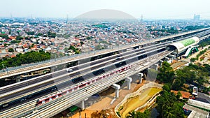 a train track that gives color and life to the humans beneath it