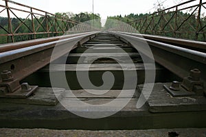 Train track on the historic iron railway bridge - Pilchowice Lake - Lower Silesia, Poland.