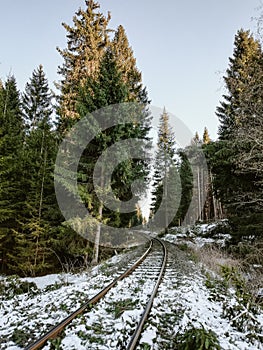 train track in natural winter landscape in the Harz Mountains, Germany