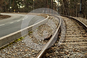 Train track next to the road at the old Camorritos station in Cercedilla, community of Madrid, Spain photo