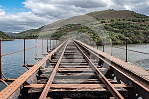 The train track over the metal bridge photo
