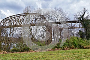 Train track railway bridge views along the Shelby Bottoms Greenway and Natural Area over Cumberland River frontage trails, Music C photo