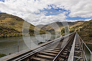 Train tracks along the Douro River in the wine region of the Douro Valley in Portugal