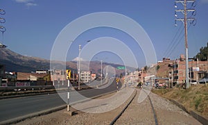 Train tracks and avenue photo