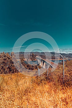 Train tracks on a bridge over the river