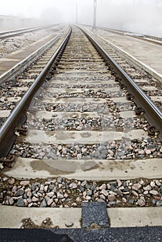 Train Tracks Disappear Into Fog 3