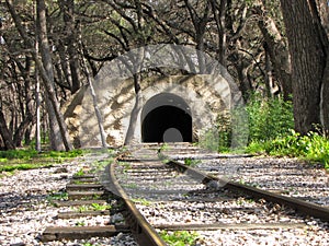 Train Tracks Leading to Tunnel