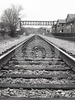 Train tracks at the Marietta Square in black and white