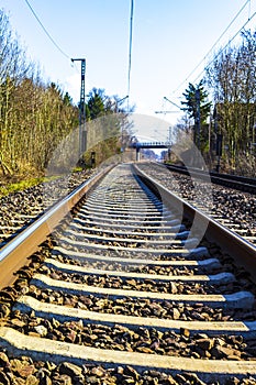 Train tracks through nature to infinity in Germany