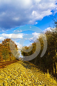 Train tracks through nature to infinity in Germany