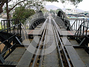 Train tracks over the Bridge on the River Kwai. World War II in Kanchanaburi, Thailand