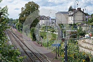 Train tracks and platform at the train station Auvers-sur-Oise, France