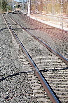 Train tracks with the power poles