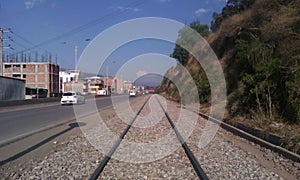 Train tracks and rocks photo