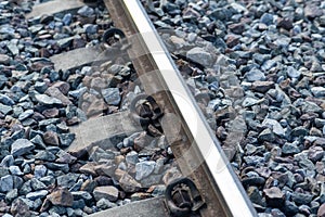 Train tracks in rural scene. Railroad in the park. vintage railroad close up