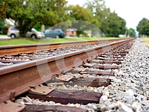 Train tracks up close with rocks