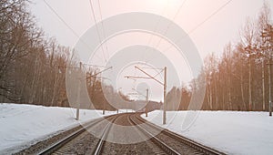 Train tracks in winter mist